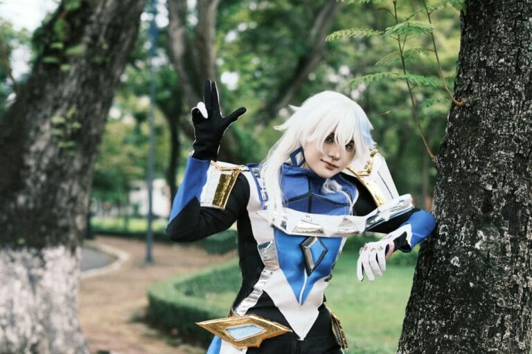 Character Ai Creator Monetization Guide 41 A Cosplayer Dressed As A Fantasy Character Poses Playfully In A Lush Green Park.