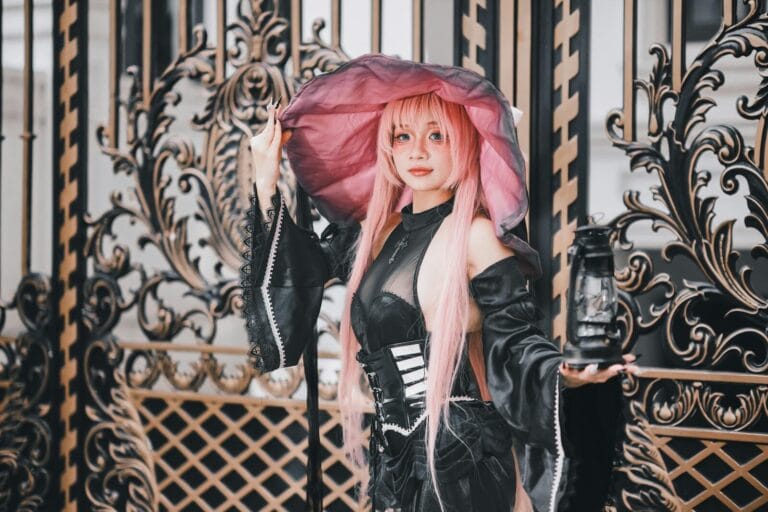 How To Make Money With Character Ai Content 34 A Stunning Cosplay Witch With Pink Hair Holding A Lantern By An Intricate Gate.