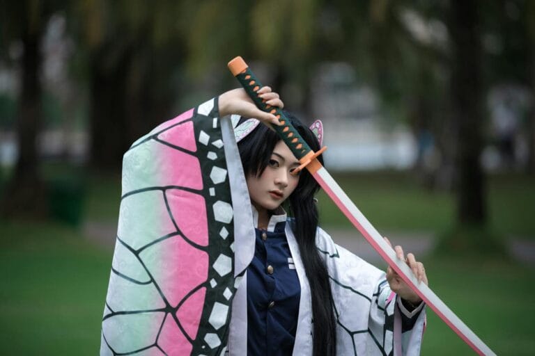 Why Character Ai Is So Popular 37 A Cosplay Character Poses With A Sword Outdoors, Displaying Intricate Costume Design.