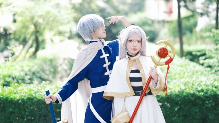 Character Ai Conversation Starters 11 Cosplayers Dressed In Fantasy Costumes With Props Pose Outdoors In A Whimsical, Vibrant Setting.