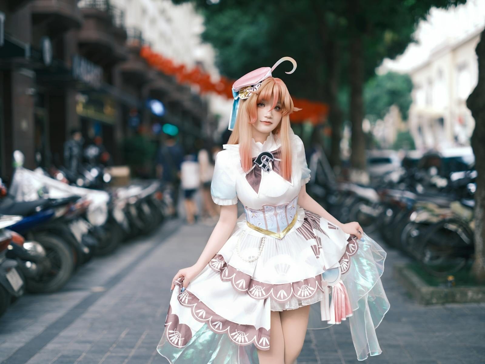 A stylish cosplay character in a vibrant outfit posed on a bustling street.