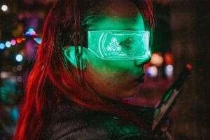 a woman wearing a pair of glowing glasses